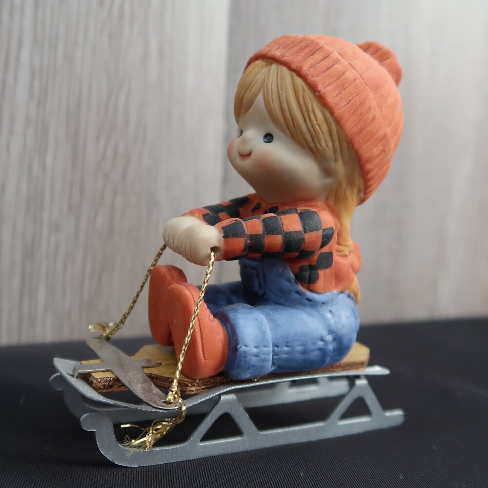 Vintage Enesco Girl on Sled Orange Hat Christmas Figurine Holiday Decor Finds